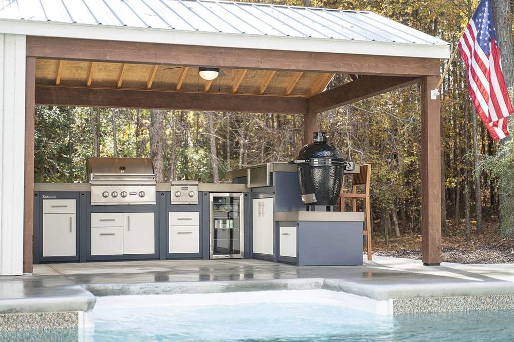 An outdoor fireplace and living space