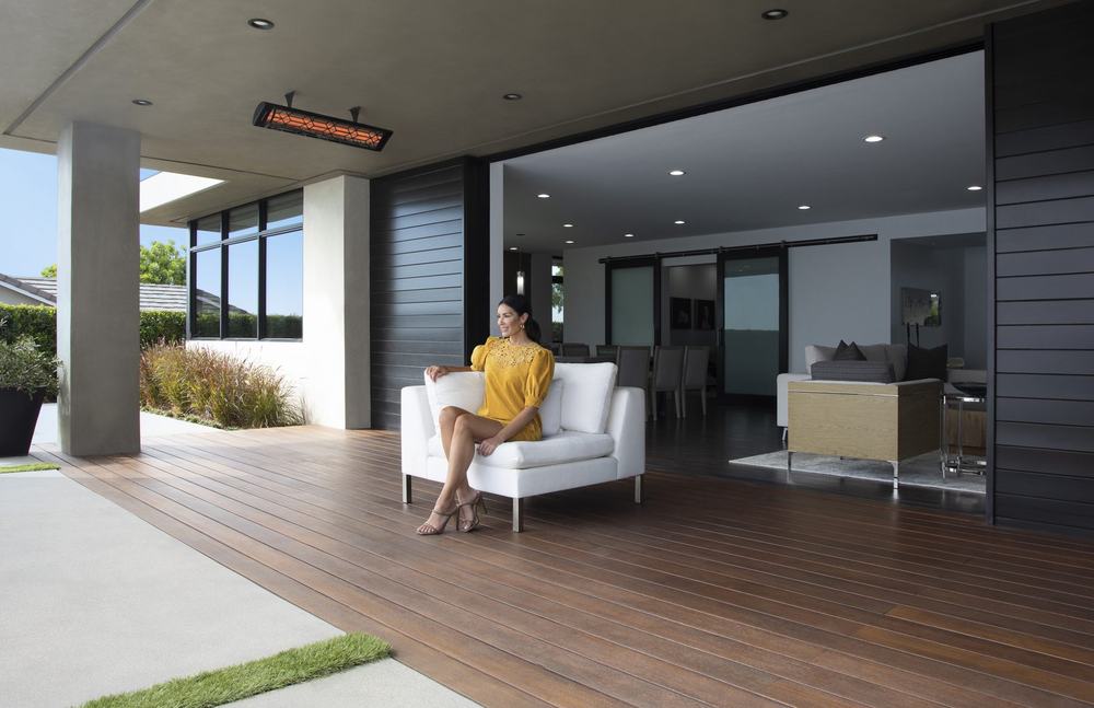 An outdoor fireplace and living space