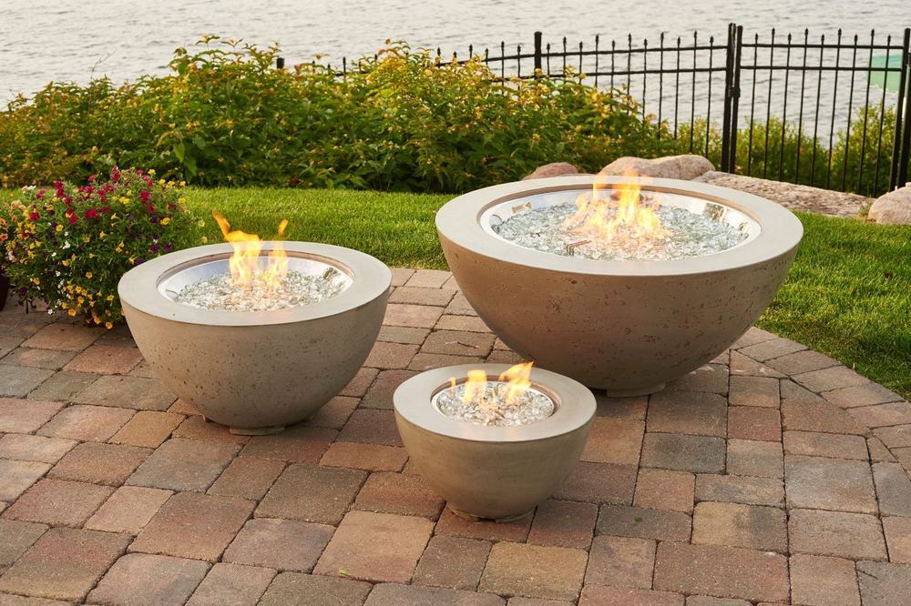 An outdoor fireplace and living space